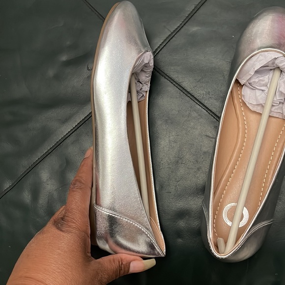 Silver flats never worn. Ordered & arrived from retailer w/o a box as pictured. - Picture 4 of 11